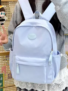 Hellblauer bonbonfarbener Studentenrucksack mit großer Kapazität und minimalistischem Design