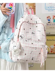 Pink checkered backpack with cute bear patterns for school students macro view and details