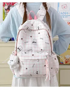 Cute pink plaid student backpack with cartoon bear patterns and plush puppy charm