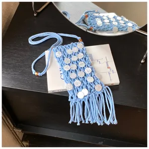 Handcrafted blue macrame phone bag with white paillettes and long decorative tassels.