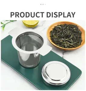 Infuseur a the en acier inoxydable filtre fin detail avec couvercle et poignees.