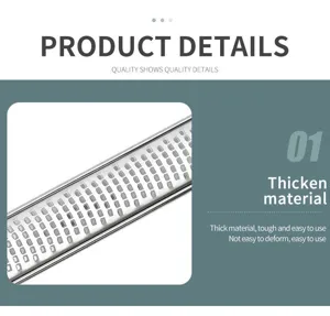 Stainless steel cheese grater lemon zester detail view showcasing thickened durable blade.
