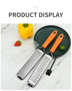 Edelstahl Käsereibe Set mit Zitronenreibe und orangefarbenem Griff für die Küche.
