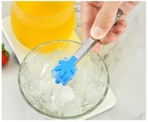 Stainless steel mini ice tongs with blue silicone palm head, perfect detail view for kitchen bar use.