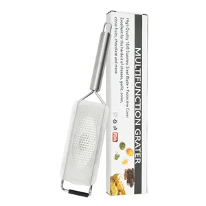 Râpe à fromage et zesteur de citron multifonction en acier inoxydable avec couvercle.