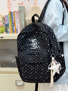 Stilvoller schwarzer Schulrucksack mit Sternen- und Punktmuster und feiner weißer Stickerei