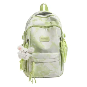 Front view of tie-dye green backpack with plush rabbit charm and large capacity