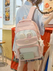 Zaino scolastico rosa a pois con orecchie di coniglio e tasca itabag trasparente.