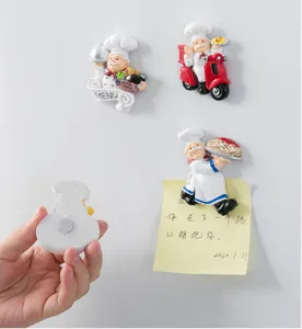 Close-up detail of cute 3D chef resin fridge magnets, decorative magnetic board stickers.