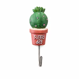 Detailed view of cute cactus resin pot stainless steel wall hook with sunny day print.