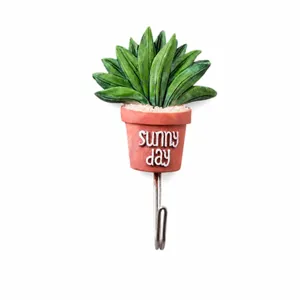 Succulent potted plant stainless steel wall hook detail, long leaf design, home decor.