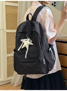 Schwarzer Schülerrucksack mit Streifen-Schleifen-Muster und Stern-Plüschanhänger
