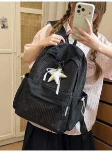 Schwarzer Schulrucksack für Schüler mit Schleifenmuster und Stern-Plüschanhänger