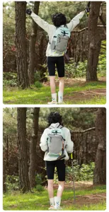 Outdoor hiking backpack in nylon color-blocked design shown on model in a forest