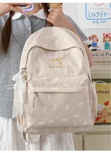 Vue détaillée du sac à dos Harajuku à carreaux beige avec des motifs de nœuds mignons