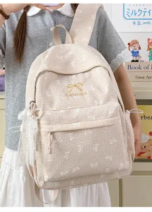 Détail du sac à dos Harajuku à carreaux vichy avec broderies de nœuds blancs mignons