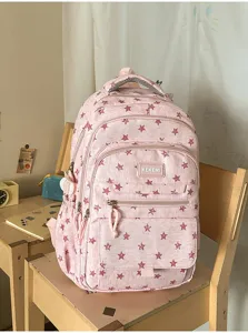 Full view of pink star pattern student backpack with multiple compartments
