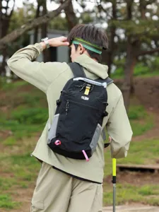 Black outdoor hiking nylon backpack with grey side panels for travel and sports