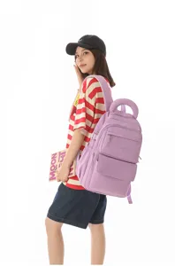 Purple school backpack for girls, large capacity, shown on model with school style.