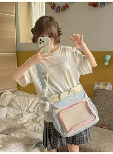 Student wearing a Japanese style pastel ita-bag crossbody in a sweet casual bedroom setting