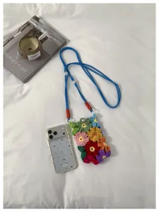 Sac de téléphone en crochet fait main avec des motifs floraux colorés et bandoulière