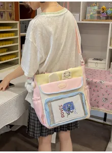 Japanese style pastel ita bag worn by a student model in a sweet and fresh lifestyle setting