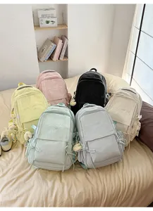 Variété de sacs à dos colorés pour étudiants avec broderie minimaliste 'Have a good day'