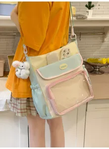 Girl wearing a pastel Japanese Ita bag with bunny ears and clear window display
