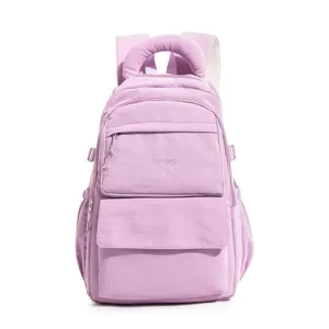 Front view detail of a lavender purple student backpack with embroidered CHILANG logo