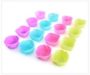 Close-up of colorful silicone baking cups set with various cute shapes for cupcakes.