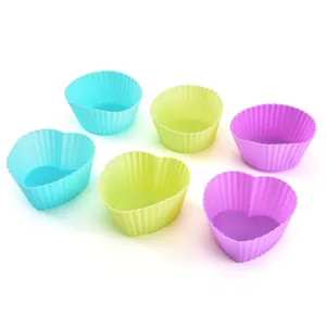 Colorful silicone cupcake molds baking cups set for kitchen pastry making tools and cake decorating.