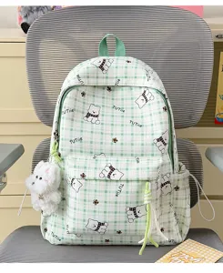 Green checkered student backpack featuring cute cartoon bear patterns and a plush charm