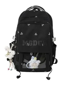 Süßer schwarzer japanischer Schulrucksack mit weißen Schleifenmustern und Plüsch