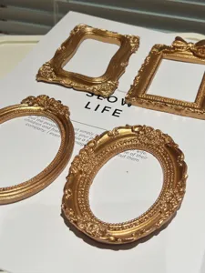 Vintage gold miniature picture frames set for nail art jewelry photography background props.