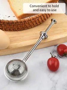 Stainless steel telescopic powder shaker detail, spherical mesh and push rod design.