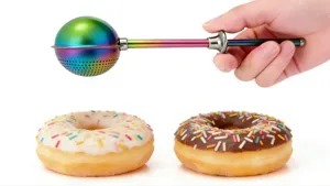 Rainbow telescopic ball powder sifter detail showing kitchen baking tool with donuts scene.