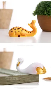 Resin cartoon animal sticky hook detail showcasing cute giraffe and swan designs for wall storage.