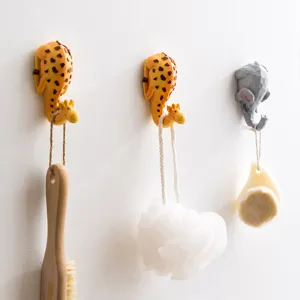 Resin cartoon animal wall hook detail shot, cute giraffe and elephant decorative hook for home decor.