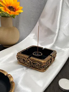 Vintage rose relief incense burner detail, retro square aroma holder, exquisite tabletop decor.