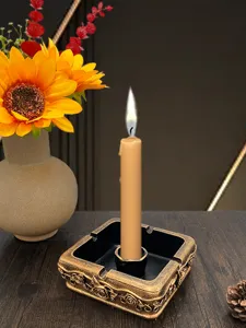 Close-up detail view of the vintage embossed square candle holder and incense burner.