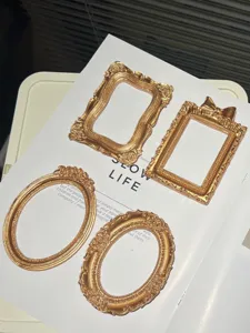 Vintage gold miniature picture frames photography props set for European jewelry nail art display.