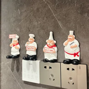 Cute cartoon chef resin wall hook for cable storage, adhesive plug holder and home decor.