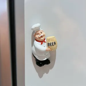 Resin cartoon chef fridge magnet, cute beer barrel design, practical home kitchen decor detail shot.