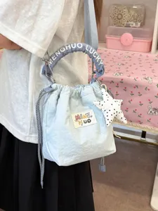Borsa a secchiello con coulisse in stile giapponese colori pastello con ciondolo a stella