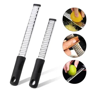 Stainless steel zester grater detail featuring sharp microplane blades and ergonomic handle.