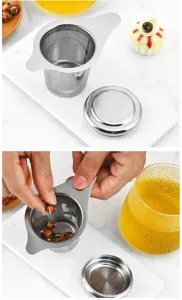 Stainless steel tea infuser detail showing fine mesh strainer basket and ergonomic dual ears.