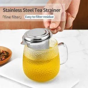 Stainless steel tea strainer with fine mesh filter for loose leaf tea and residue filtering.