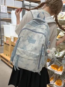 Blue tie-dye large capacity backpack for students with cute bunny plush pendant accessory