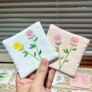 Handmade resin square coaster with 3D rose relief, perfect for jewelry dish or home decor.