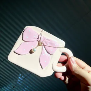 Pink bow jewelry dish and pearl necklace tray, elegant desktop storage and photo prop.